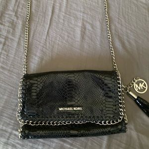 Black snakeskin cross body bag.